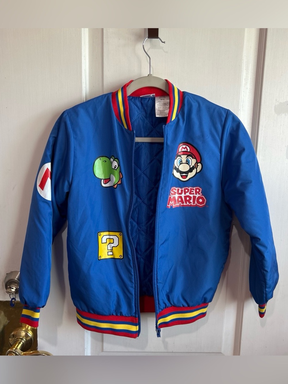 Nintendo Blue Super Mario Patch Puffer Jacket. Boys size 10-12